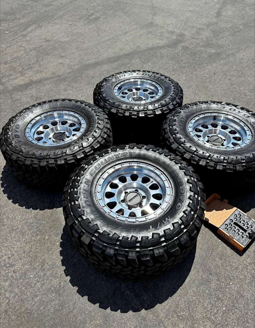 Method MR315 Machined 17x9 Wheels with -12 Offset* - *35" Toyo Open Country MTs (Mud-Terrains) with 95% Tread Life*