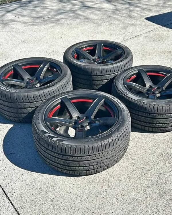 Dodge Charger Hellcat Carbon Fiber dip wheels with tires.