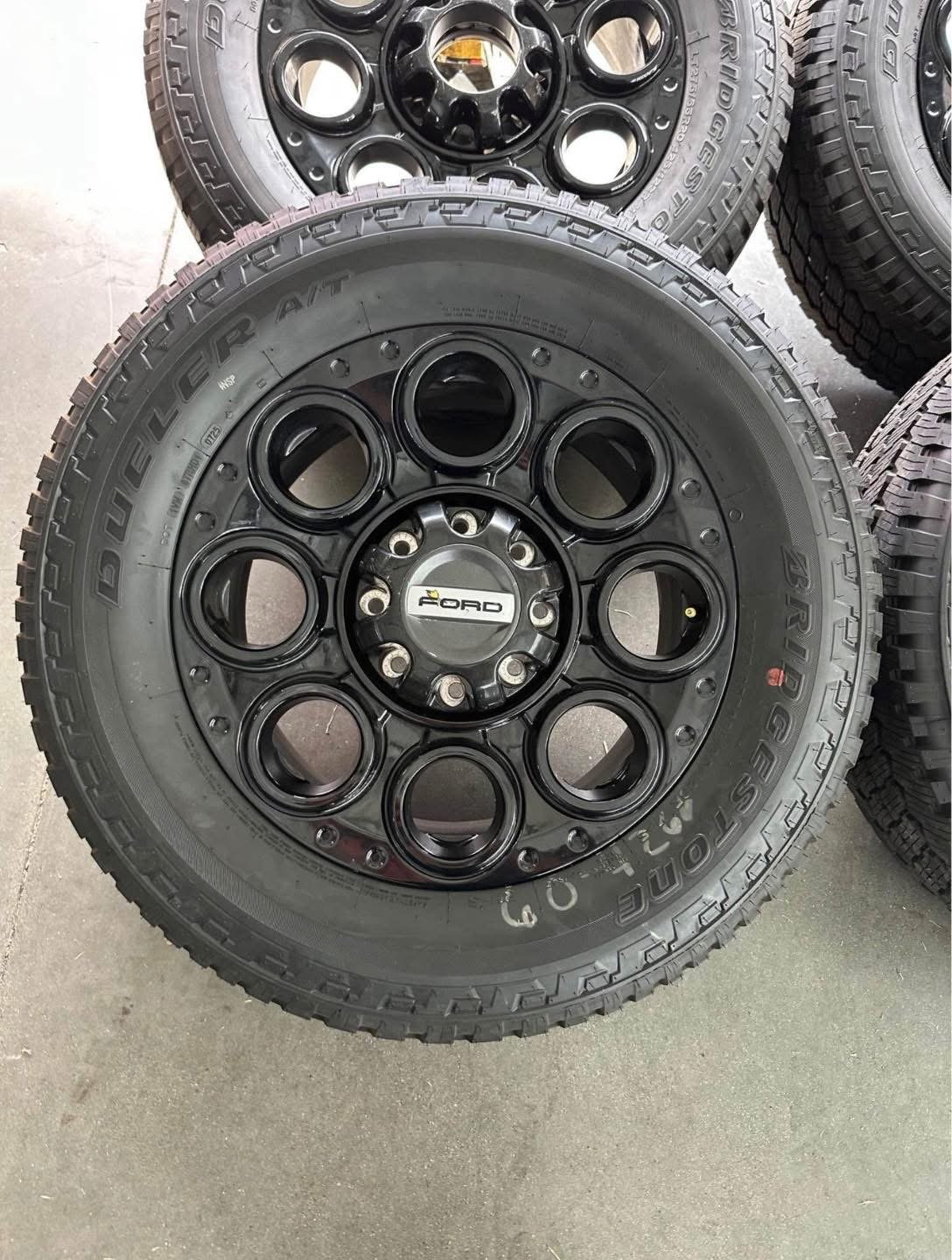20in OEM F350 superduty FX4 package rims 275/65/20 Bridgestone dueler all terrain tires Wheels are 20in OEM wheels off a 2026 ford f350 sport FX4 upgrade package. - Image 7